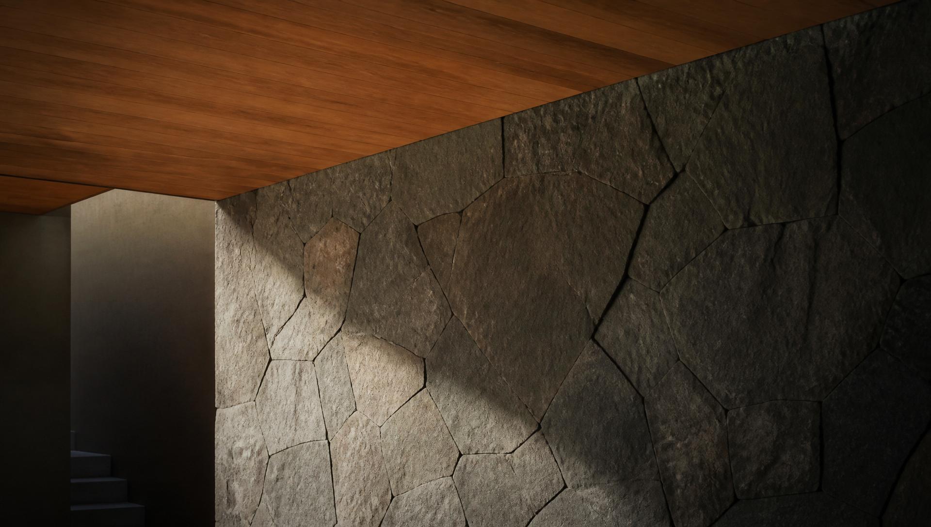 Stone and warm wood meeting in soft light